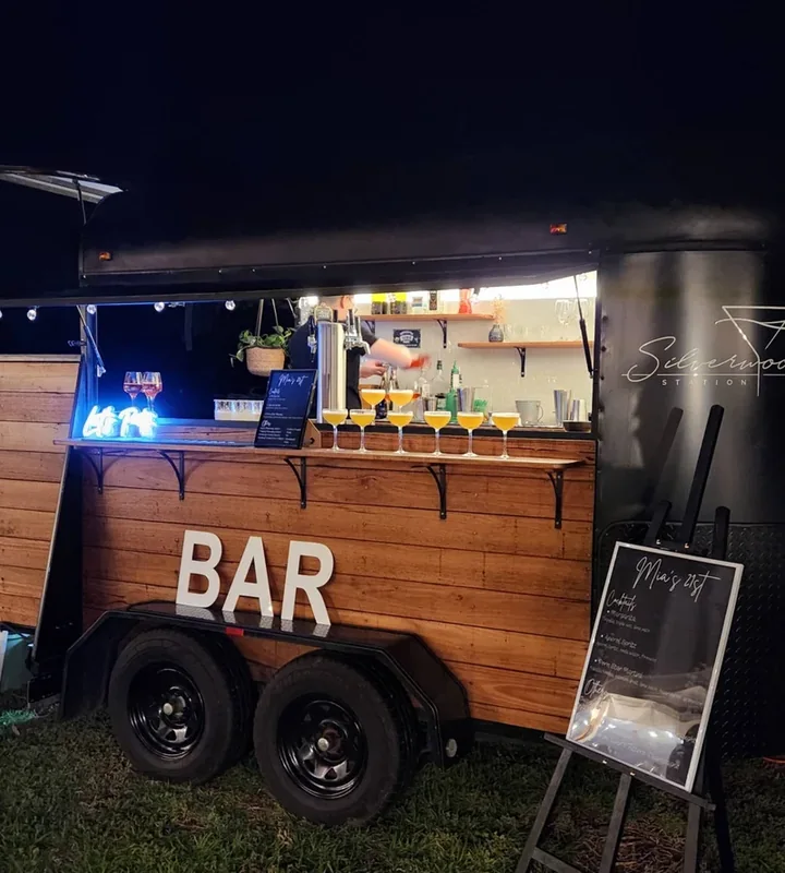 Silverwood Station horse float bar lit up at an evening event